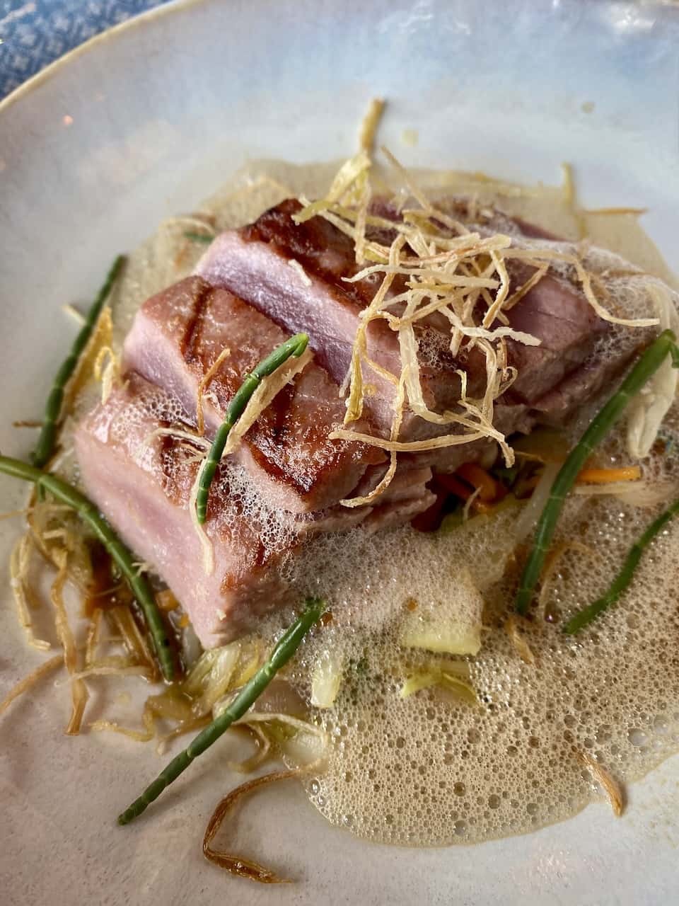 Casinha na Baixa - Fresh Tuna at Restaurante Cestaria a beautifully presented dish with pieces of tuna on a plate